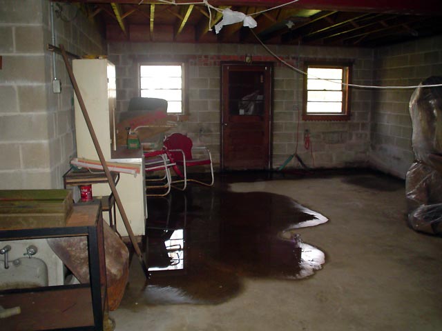 Steps To Take Before Finishing Your Basement A Flooded Basement Showing Groundwater Intrusion In Custom T Major City 1