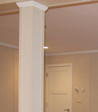 Easy Wrap column sleeves in basement